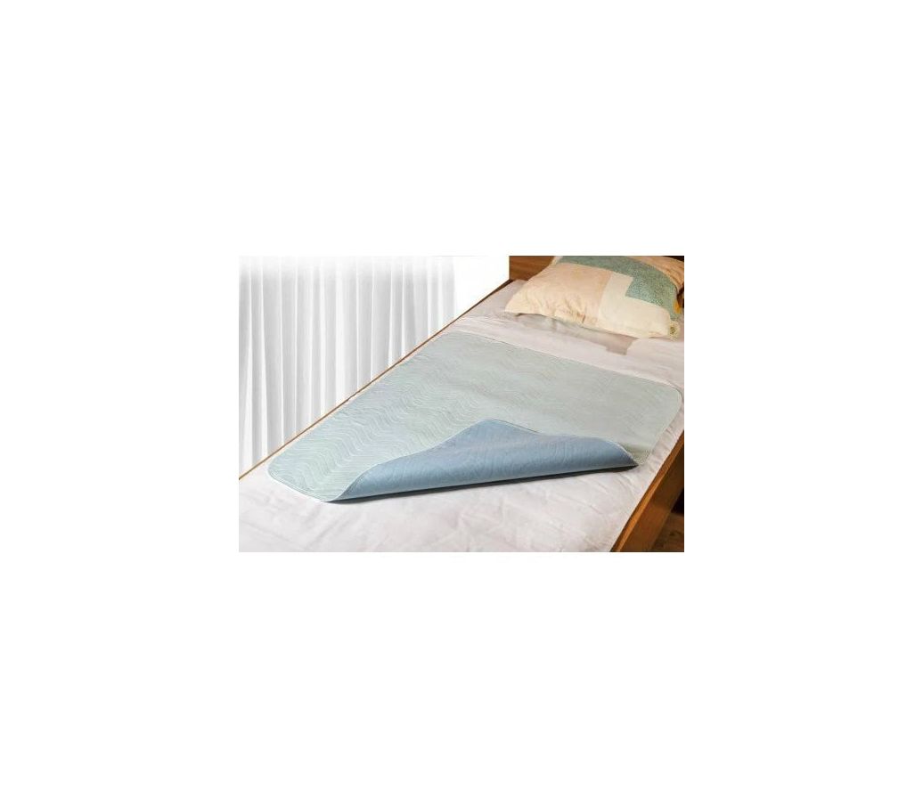 MultiMotion wasbare onderlegger (half omgevouwen op een matras) MultiMotion wasbare onderlegger (half omgevouwen op een matras)