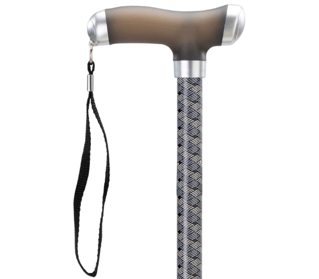 MultiMotion wandelstok met siliconen handvat - Donkere print (ingezoomd op handvat) MultiMotion wandelstok met siliconen handvat - Donkere print (ingezoomd op handvat)