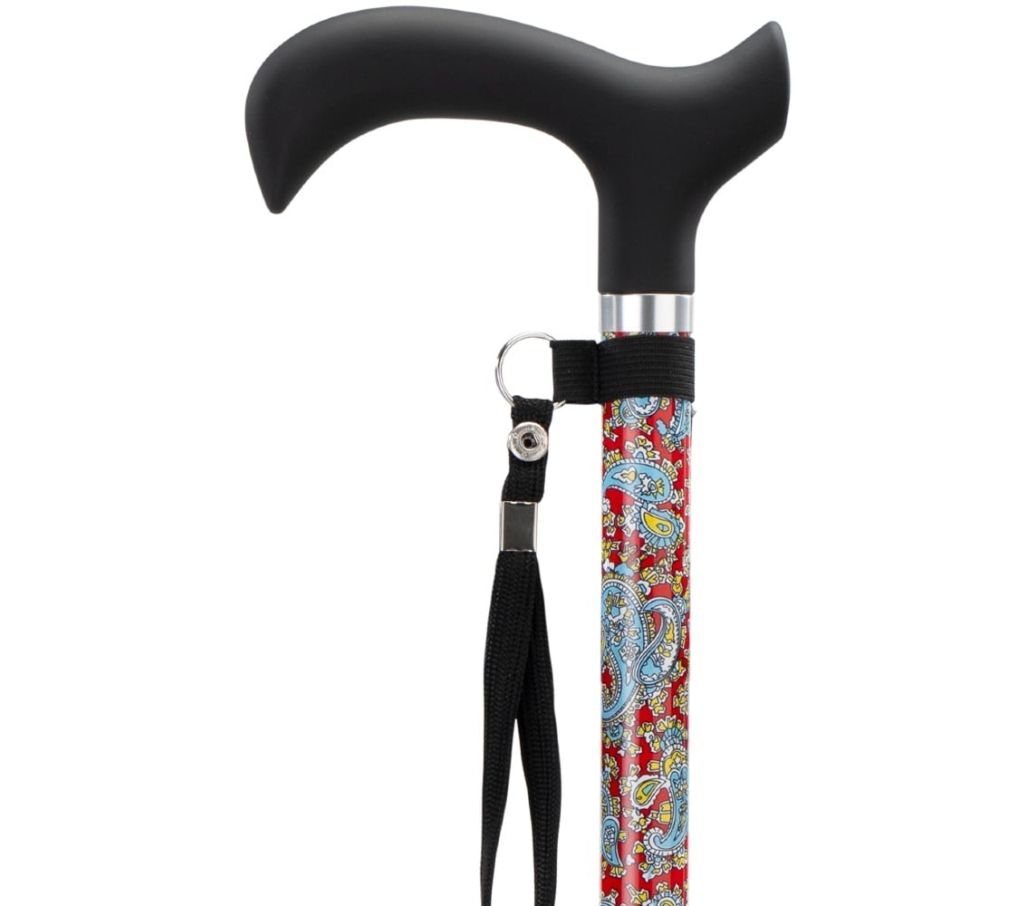 MultiMotion wandelstok - Rood paisley (ingezoomd op handvat en kleur van de buis) MultiMotion wandelstok - Rood paisley (ingezoomd op handvat en kleur van de buis)